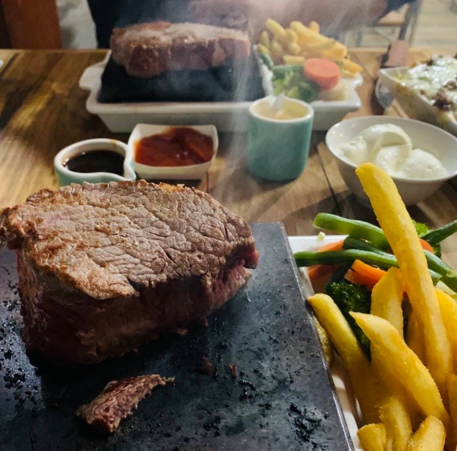 Hot rock stone cooking: where the 400-degree steak comes from
